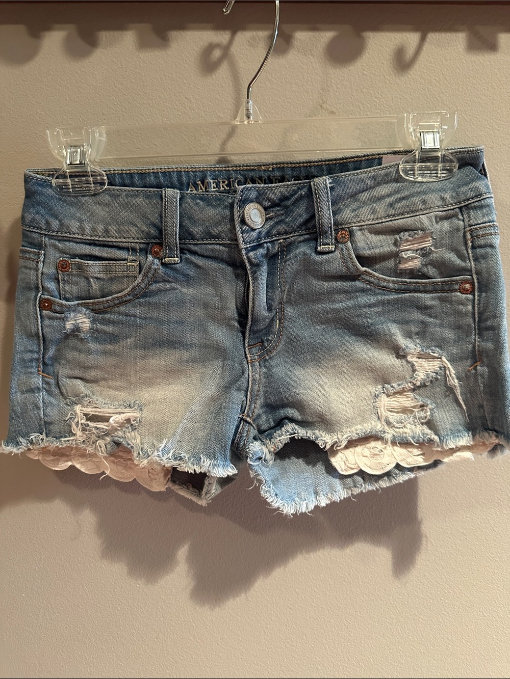 American Eagle Outfitters Light Blue Distressed Denim Shorts w/Lace Trim pockets